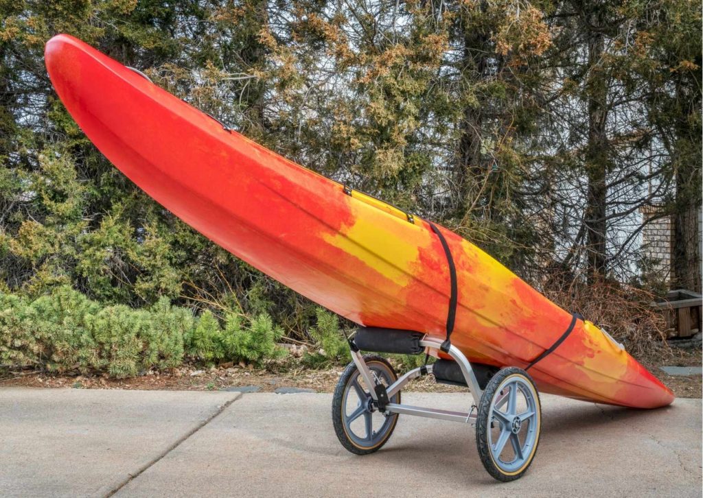 The best kayak trolley with a kayak resting on it.