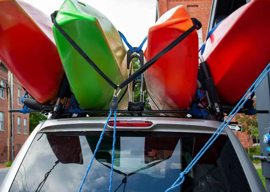 How do you attach a kayak to a roof rack Like this car with multiple kayaks strapped to the roof