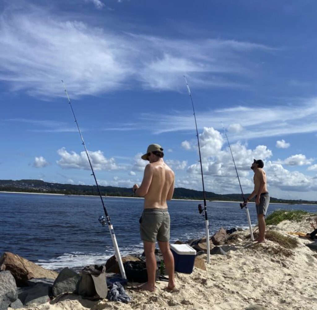 two anglers wondering what do I need for saltwater pier fishing